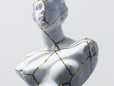 kintsugi broken and repaired with gold