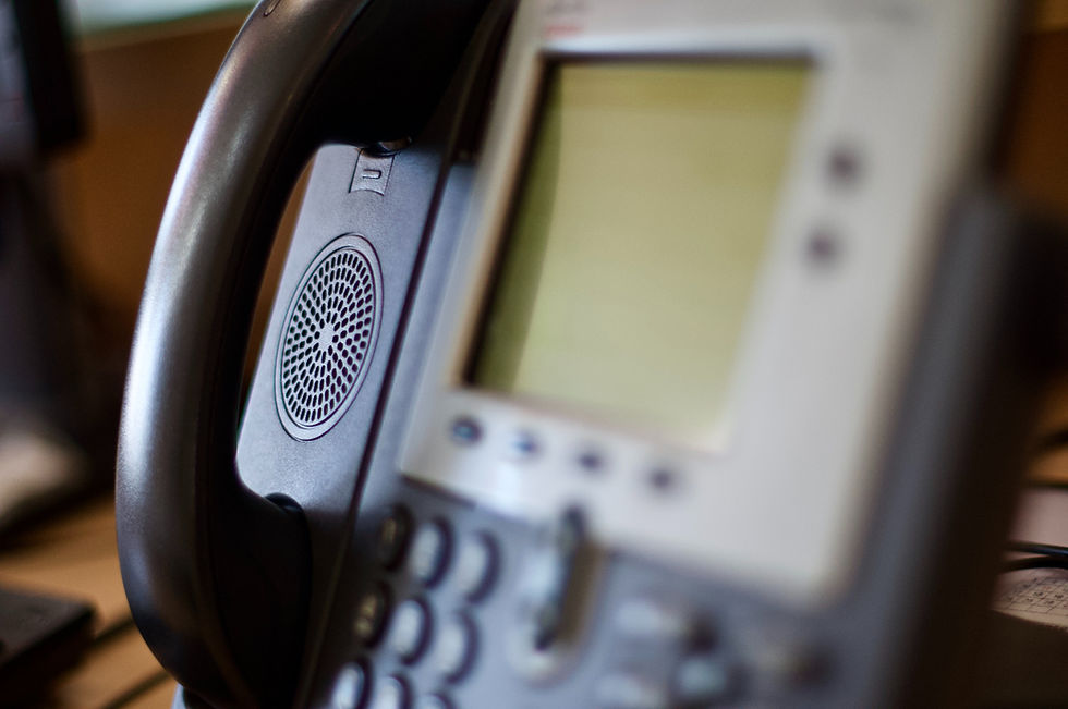 Close-up shot of a VoIP Phone sitting on a desk