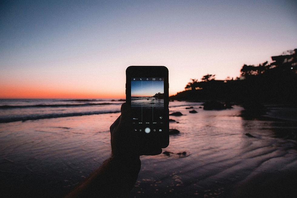 Smartphone prends une photo à la plage