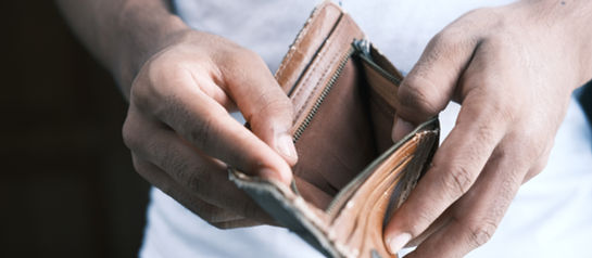 man with empty wallet