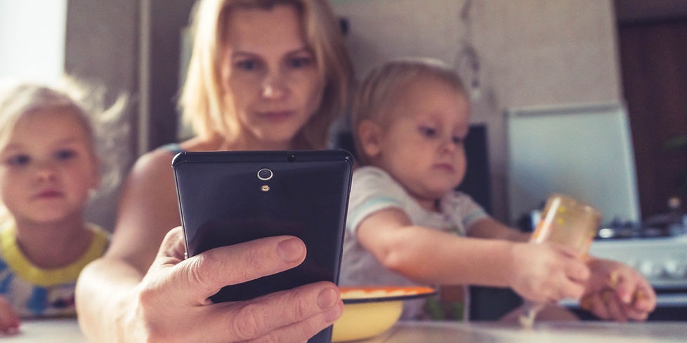 mother on phone with children