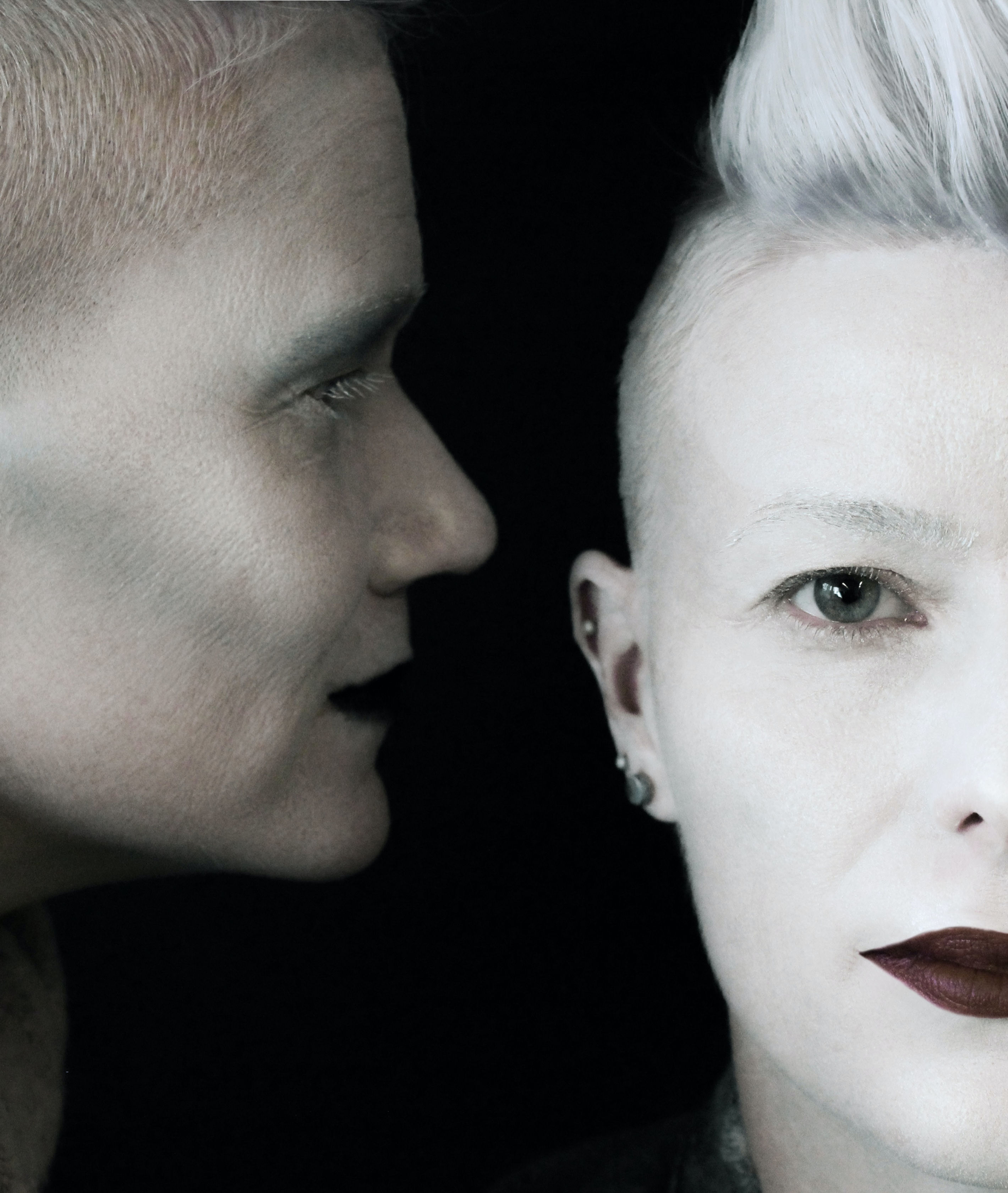 Person whispering to another individual