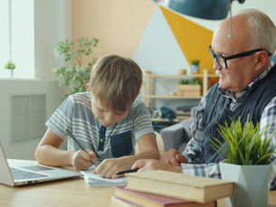 Family around laptop