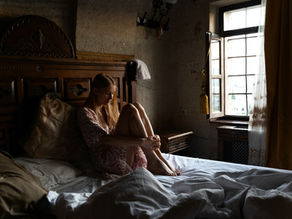 woman sitting alone after intimacy