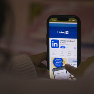 LinkedIn mobile app open on a smartphone showing a feed