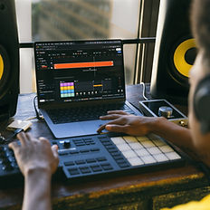 Producer making beats for clients