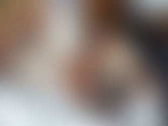 Health care provider putting bandage over vaccination site