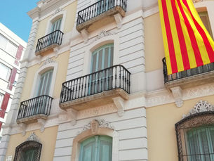 Spanish tax residency - a spanish flag on a spanish building