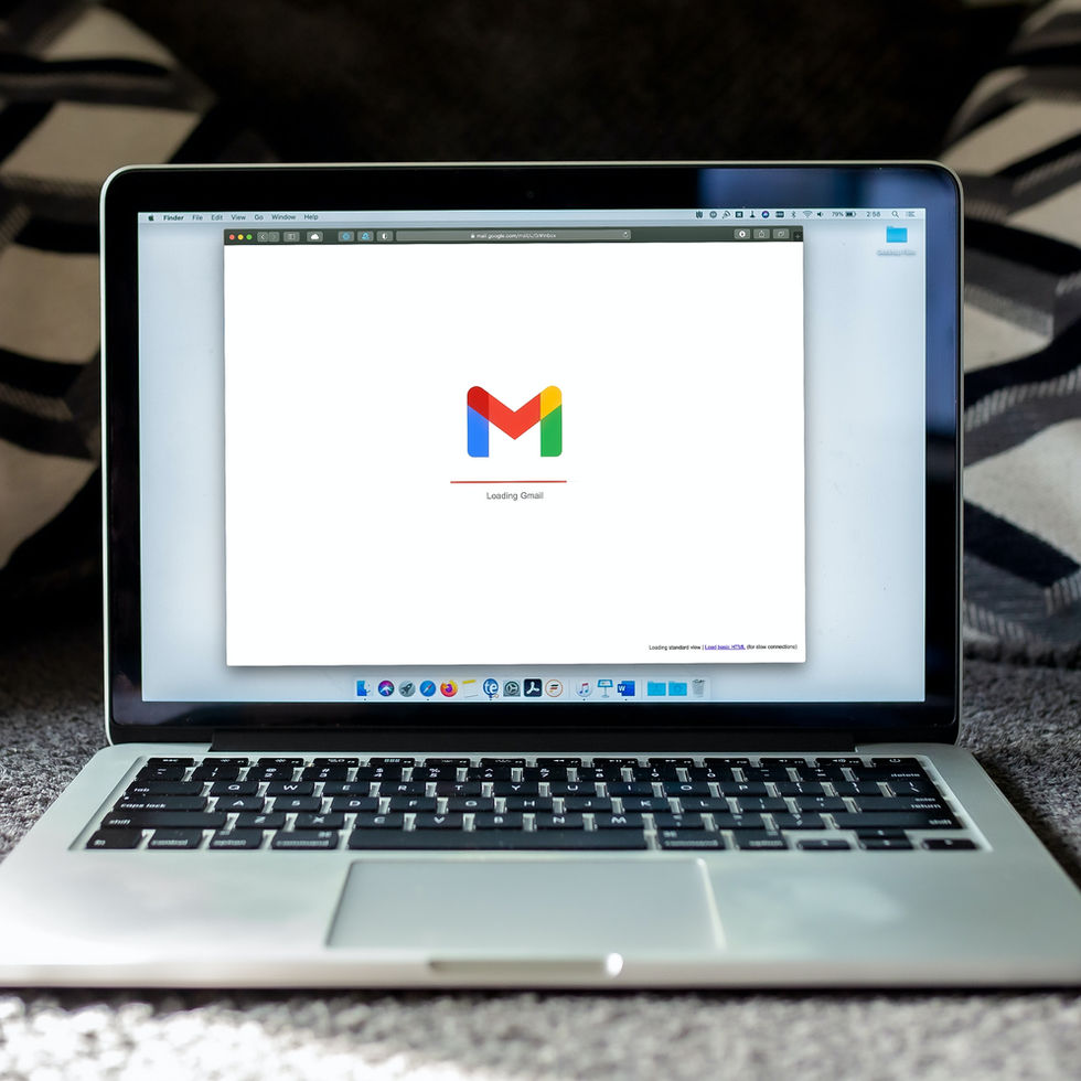 Entrepreneur's computer with e-mail marketing.