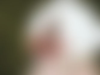 woman looking in mirror