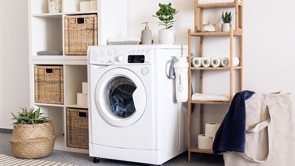 Laundry room with organized rack for baskets.