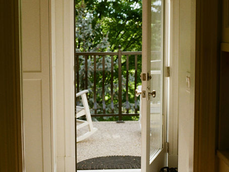 Sunlit porch of a Michigan home at the start of a new day