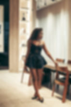 Black woman cozy apartment morning light