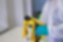 a cleaner disinfecting a telephone
