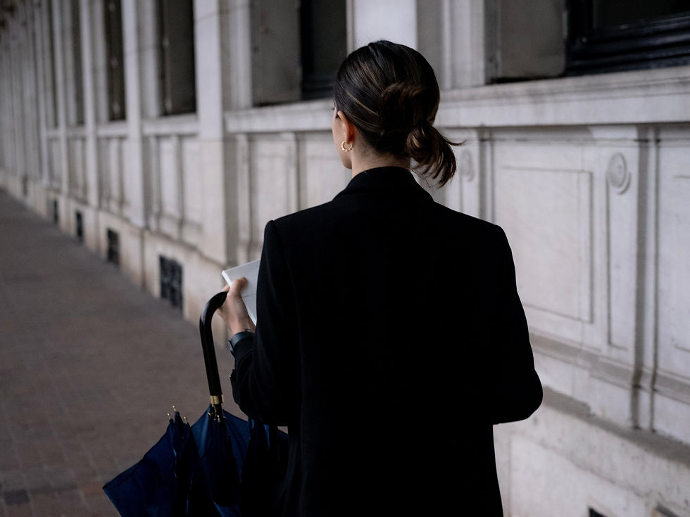 A personal injury attorney in St. George, Utah, sits across from a client, reviewing paperwork and explaining the details of their injury claim.