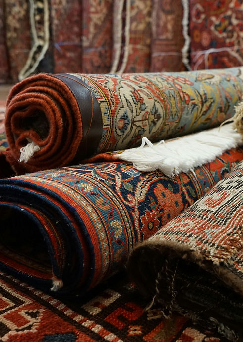 Rolled up rugs