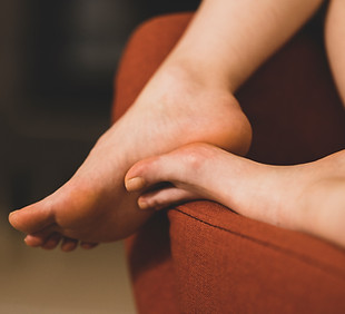 feet to give an erotic massage with foot fetish