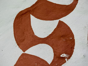 the letter S in calligraphy