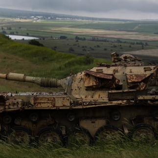 Close-up of a preserved Syrian tank turret on Mount Bental overlooking the strategic Quneitra valley.