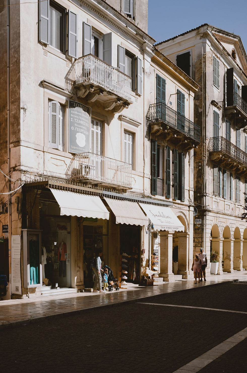High angle view of Achilleion Palace gardens with statues and greenery
