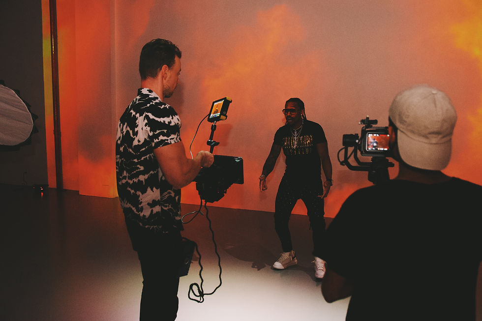 A a group of men filming a music video after buying beats online
