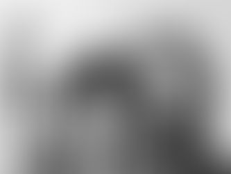 Black and white abstract painting of two figures with expressive faces; one covers their face with hands. A smokestack with a cross looms.