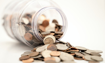 jar of coins being poured out | miGenie The Ultimate Success System