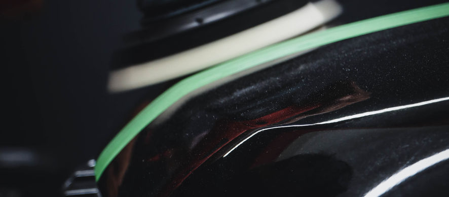 Detailing hidden work photo verification — technician using machine polisher