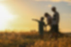 mother and son in a wheat field