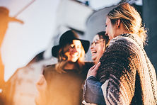 Group of people laughing and smiling