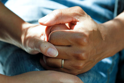 two holding hands