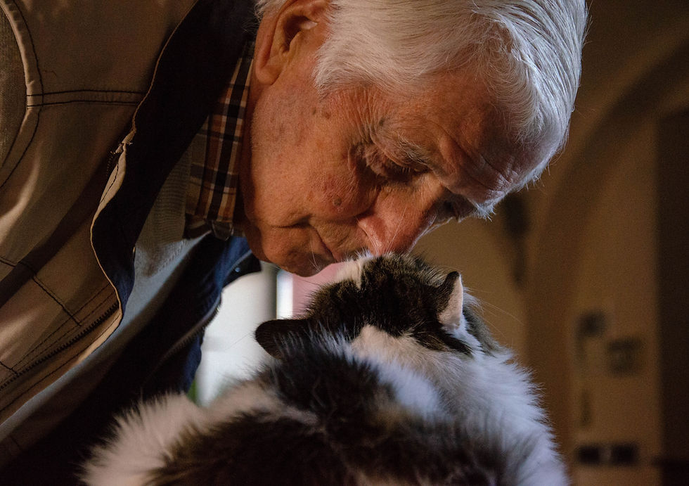 Senior man with his cat