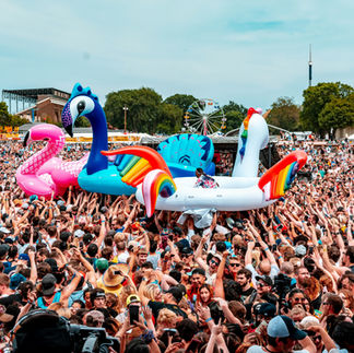 Fun at Supernova gathering inflatable toys and festival crowd Israel.