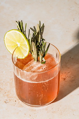 Glass tumbler with cocktail full-service | white glove interior design studio