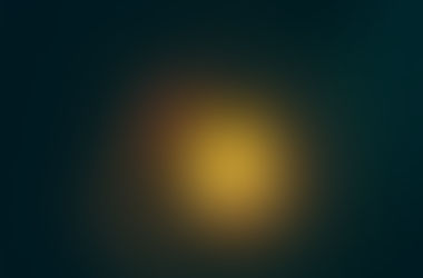 a person holding a lantern in the dark