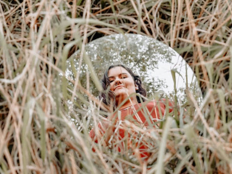 Woman looking in the mirror