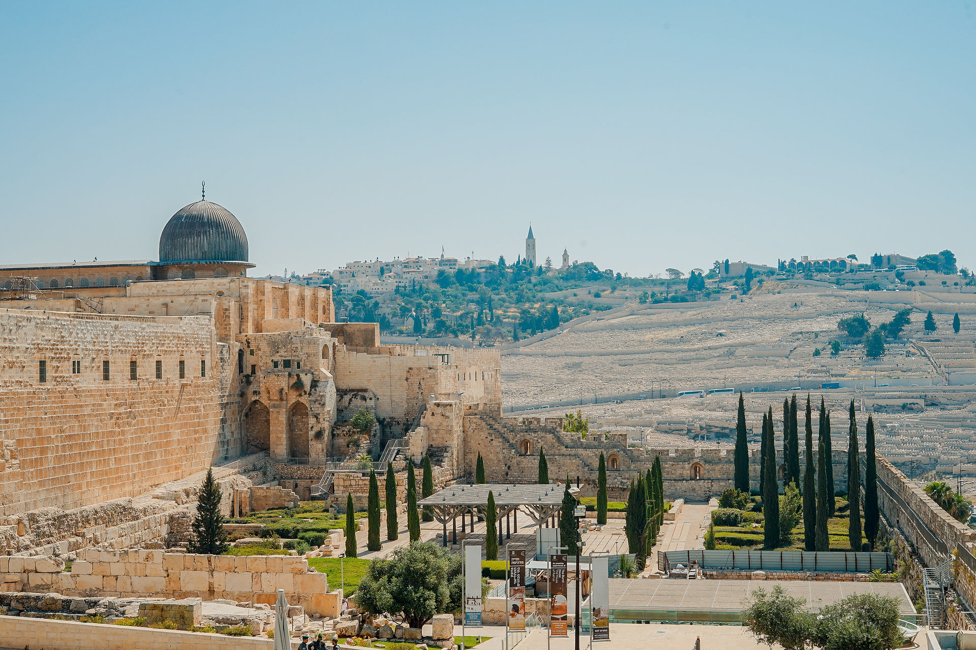 View of the ancient stones of the Southern Wall excavations with the Al-Aqsa Mosque and Temple Mount behind.
