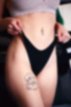 Tätowierung eines Fineline Tattoos einer Frau