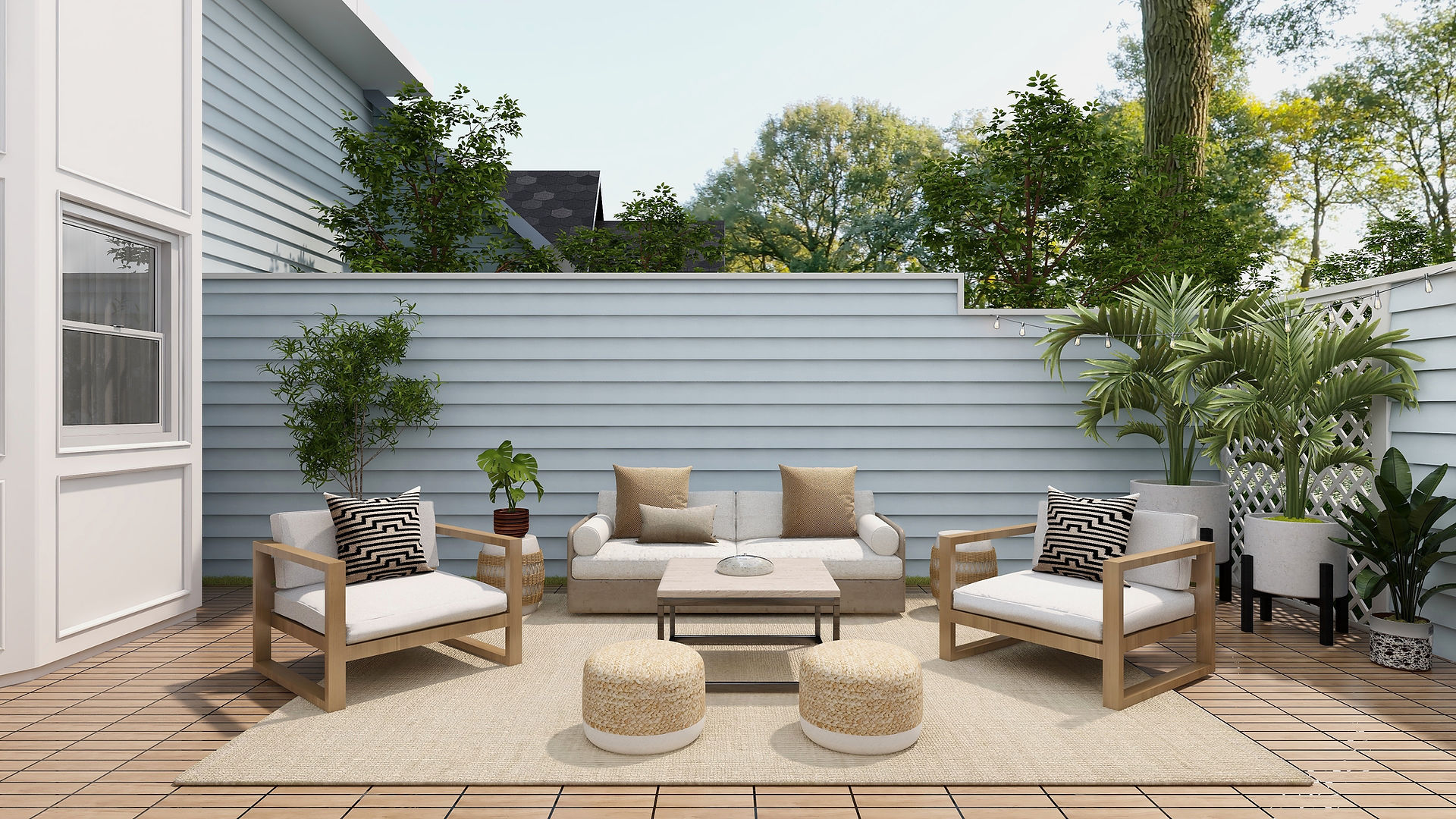 A patio furnished with comfortable furniture and lush green plants, creating a relaxing atmosphere and an ideal space in which to unwind.