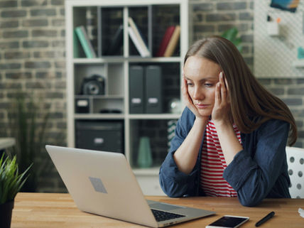 Woman tired in office