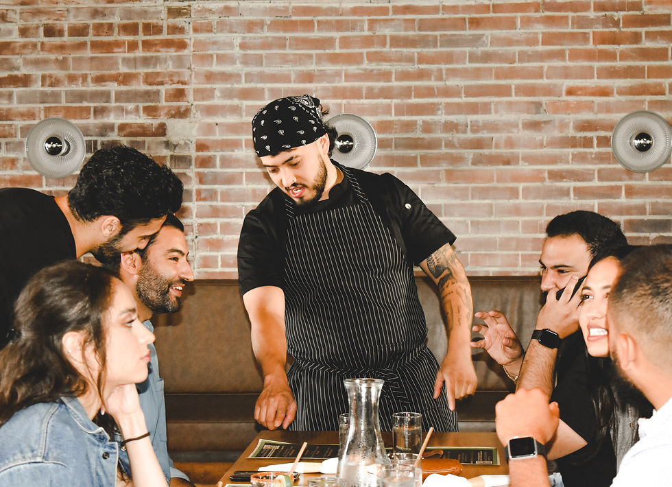 Private chef talking to his clients