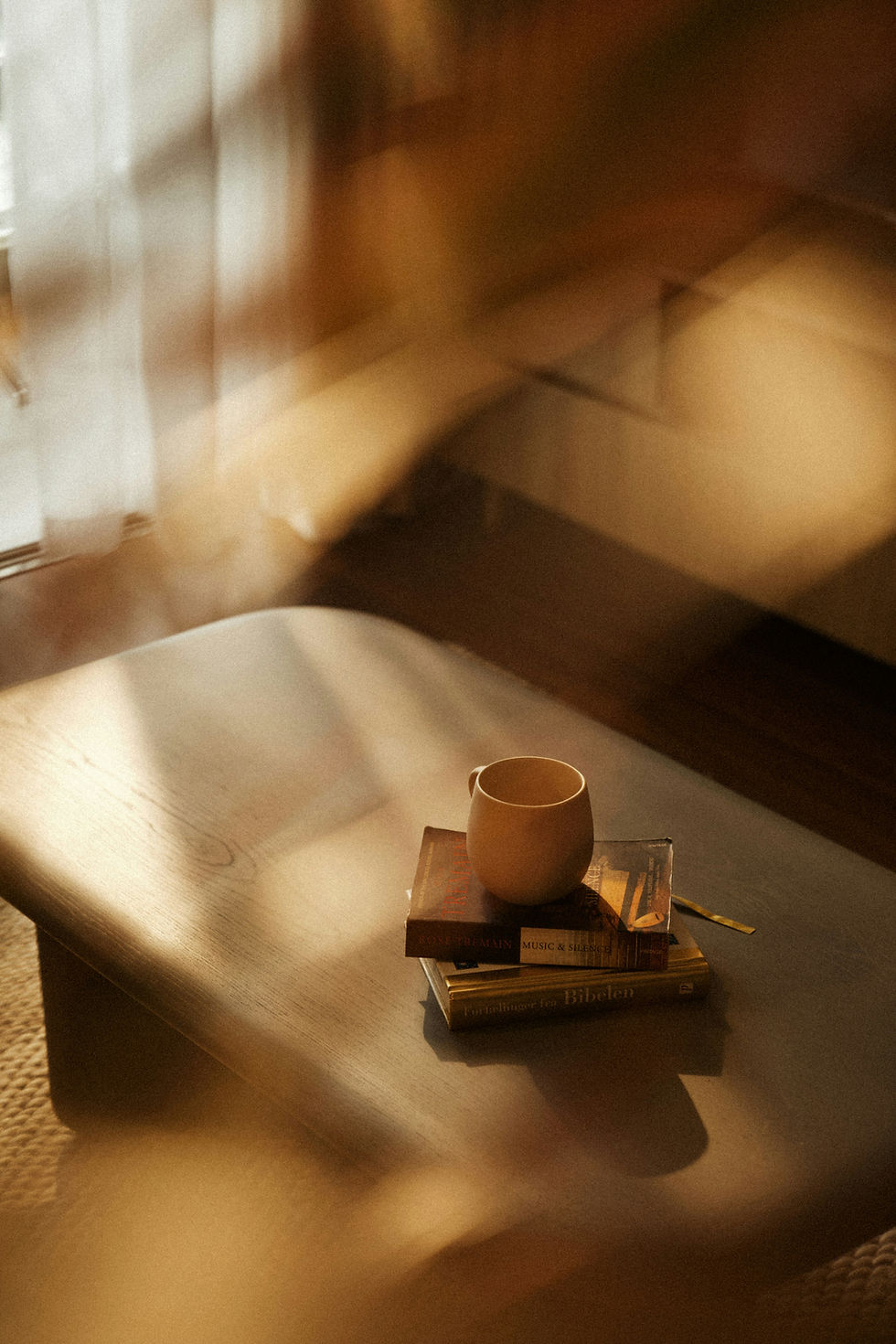 desk with books and coffee cup
