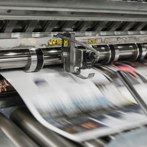 large-format newspaper printing at high speed to blur the shot