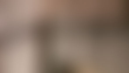 Soft morning sunlight casting shadows on beige curtains and white linen sheets, evoking a sense of intimacy and restoration in a discussion about perimenopause low libido and hormonal health. Vibrance Way