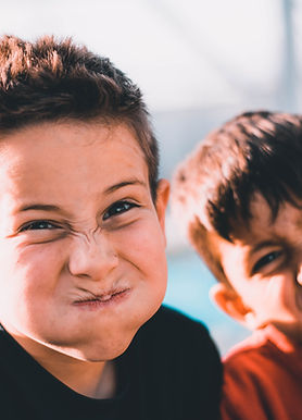 Pragmatic language therapy is designed to address challenges related to the use of language in social interactions. This includes understanding and following conversational rules, interpreting non-verbal cues, and adapting language to different social situations. The therapy begins with an assessment by a speech-language pathologist (SLP) to identify specific pragmatic language difficulties and tailor the therapy to the individual's needs.
During therapy sessions, the SLP uses a variety of techniques and activities to enhance pragmatic language skills. These may include:
Role-Playing Scenarios:
Practicing different social situations to develop appropriate responses and behaviors, such as greeting others, initiating and maintaining conversations, and taking turns in dialogue.
Social Stories and Scripts:
Using written or visual narratives to explain social rules and expectations, helping individuals understand how to behave in various social contexts.
Non-Verbal Communication:
Training in interpreting and using body language, facial expressions, eye contact, and gestures to enhance social interactions.
Conversational Skills:
Activities to improve the ability to stay on topic, use appropriate tone and volume, recognize and repair communication breakdowns, and understand the perspective of others.
Problem-Solving and Critical Thinking:
Exercises that help individuals navigate social dilemmas, understand the consequences of different actions, and develop strategies for resolving conflicts.
The therapy is often interactive and play-based, particularly for children, to keep sessions engaging and relevant to real-life situations. The SLP may also involve family members or caregivers in the therapy process to reinforce skills and strategies at home.