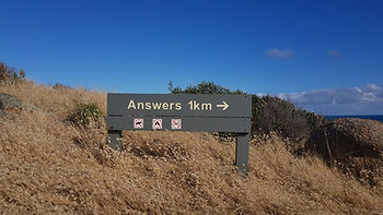 A sign that says "Answers"