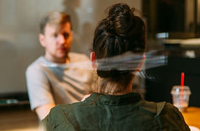 Two people talking