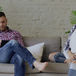 Adult couple in a tense moment at home, illustrating the parent-child dynamic in ADHD relationships — psychologist in Kirkland, WA