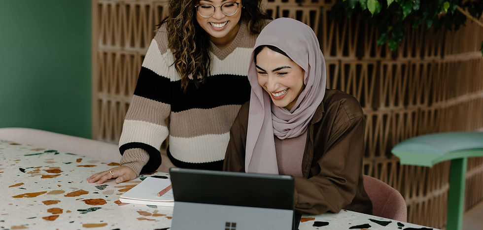 A hijabi Muslim woman with an Asian BIPOC woman looking for a virtual BIPOC therapist in Ottawa
