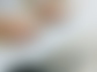 Nurse's hands typing on a computer keyboard.